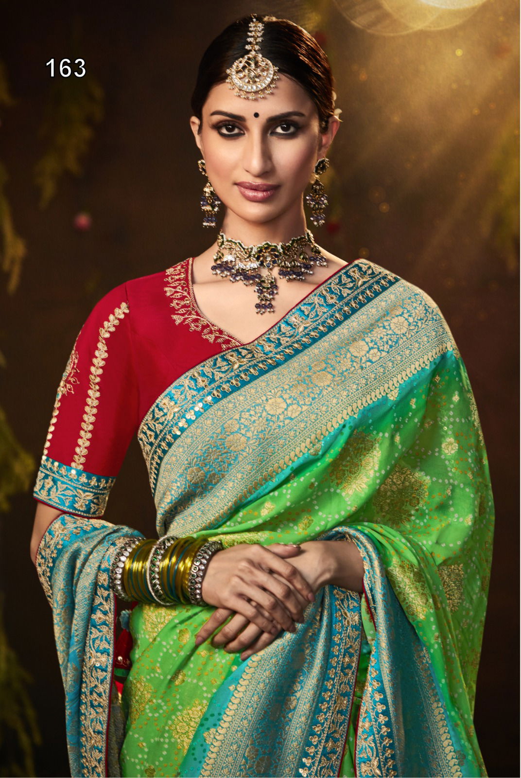 Bandhej Sindhuri By Kimora Heavy Wedding Bridal Saree Catalog